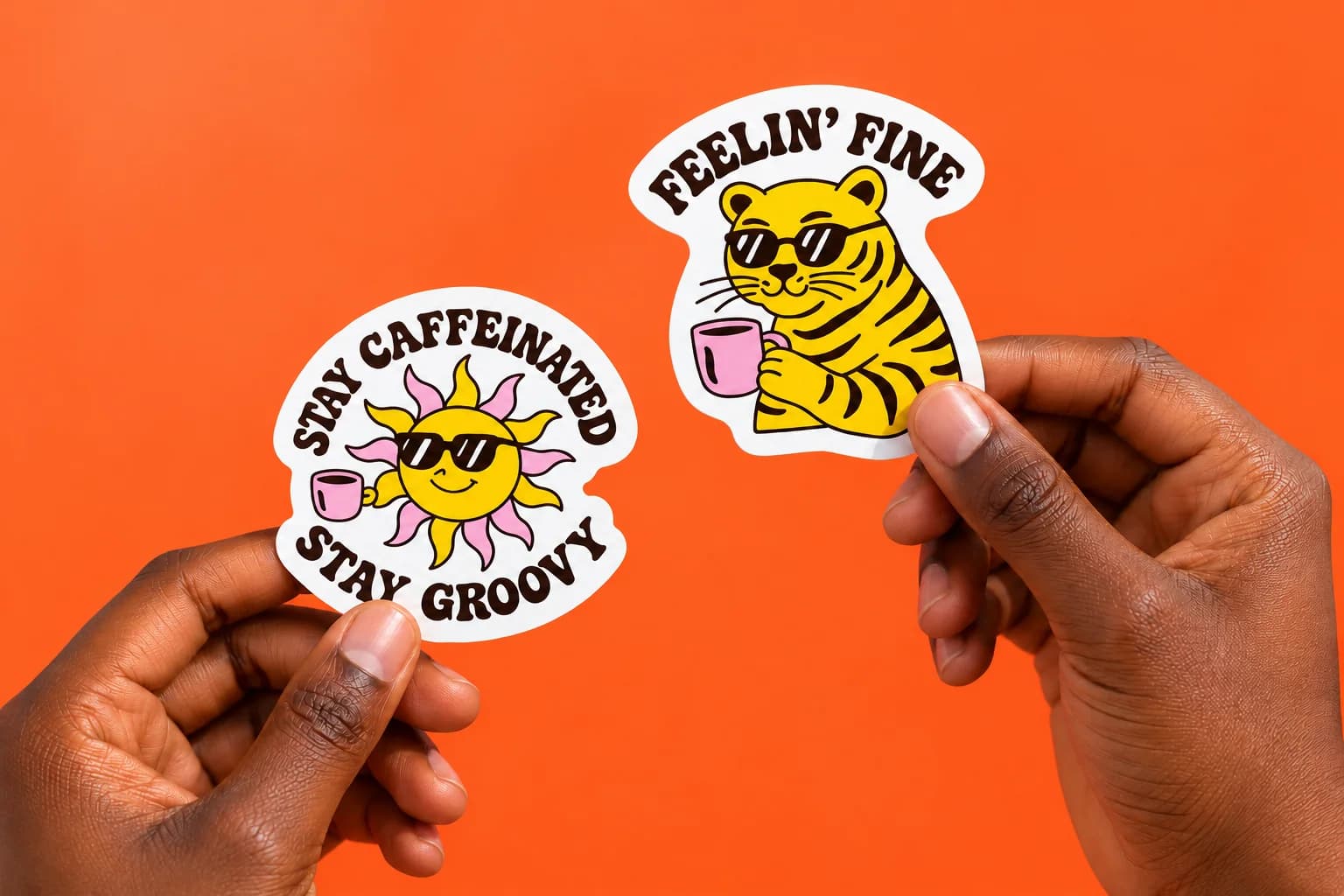 BrandHaus custom stickers being held by hand